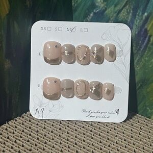 Elegant Nude and Gold Press-On Nails